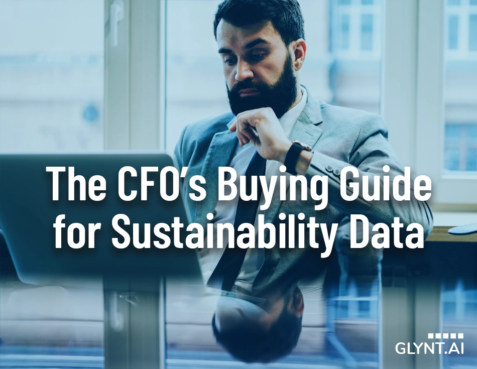 A bearded man looks thoughtfully at a laptop. Text reads, "The CFOs Guide to Sustainability Data"
